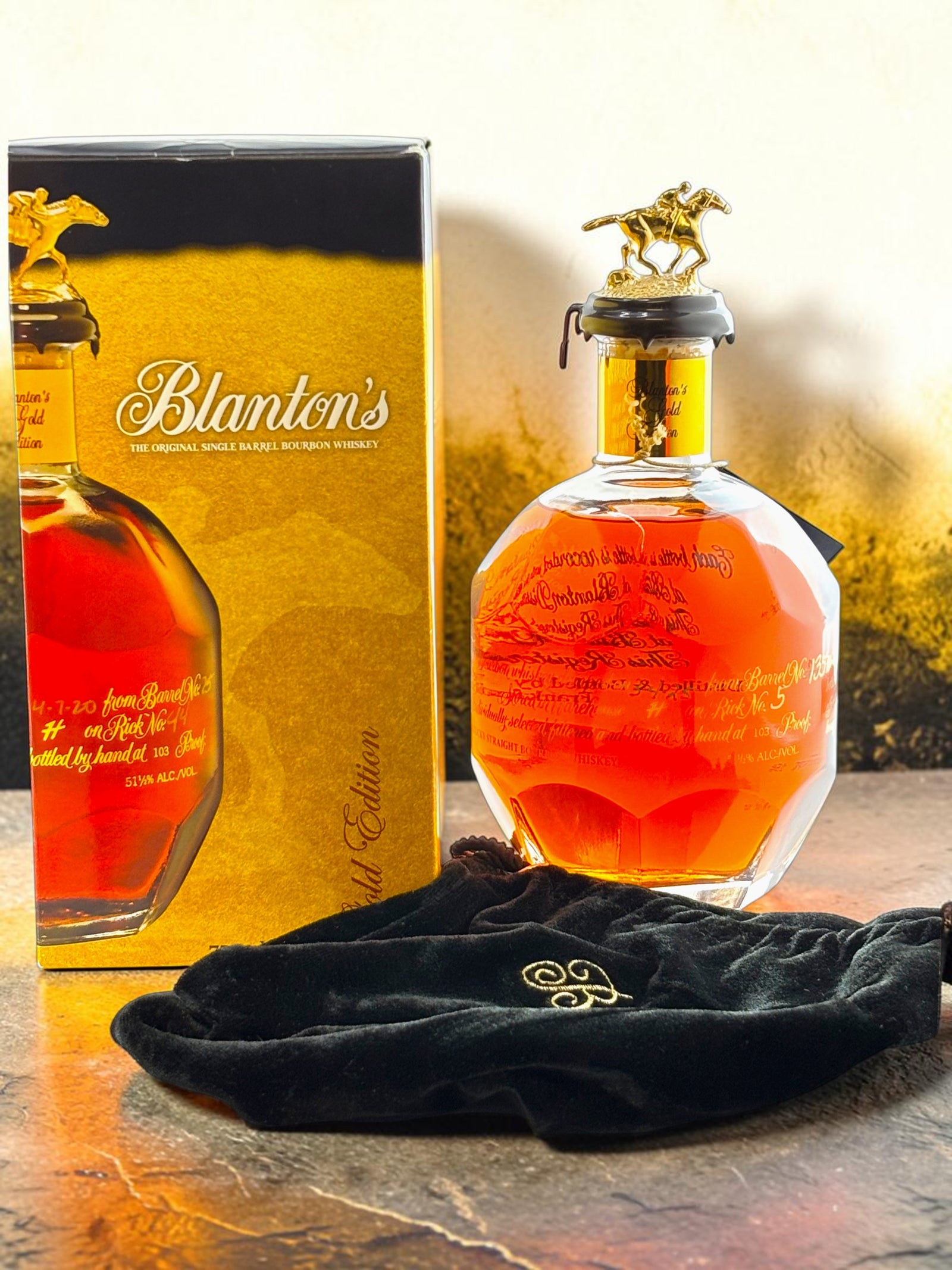  Primary
Blanton's Gold Edition Single Barrel Bourbon bottle with horse-and-jockey stopper.